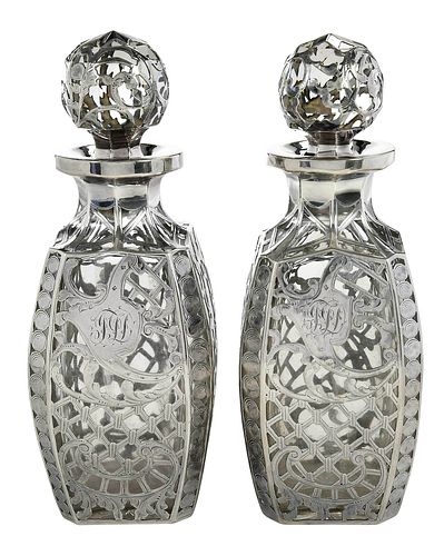 PAIR OF SILVER OVERLAY GLASS DECANTERSprobably 3799df