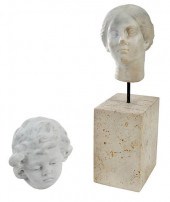 TWO CARVED MARBLE HEADSRoman or Roman