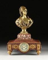 A LOUIS XVI STYLE ROUGE MARBLE CLOCK
