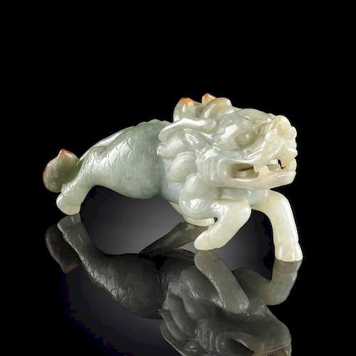 A CHINESE CARVED CELADON JADE FIGURE 381d59