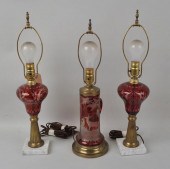 THREE RUBY CUT TO CLEAR LAMPScomprising