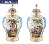 A PAIR OF GERMAN COVERED PORCELAIN URNS,