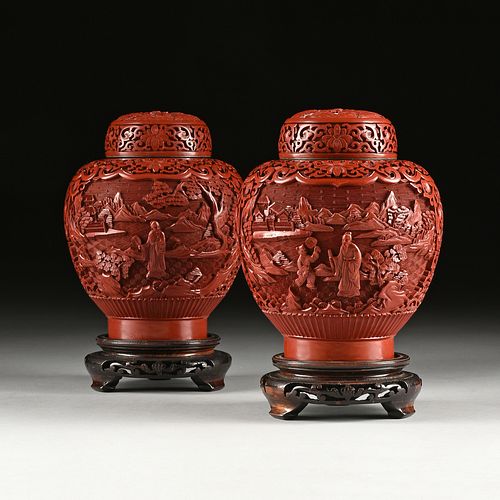 A PAIR OF CHINESE CARVED CINNABAR 380b09