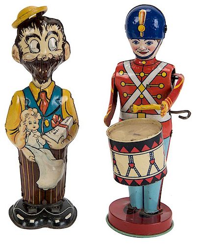 PAIR OF TIN LITHO WIND UP FIGURAL 38592f
