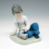 BOY WITH TRAIN - NAO BY LLADRO PORCELAIN