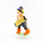 HEREND FIGURINE, BOY PLAYING AN ACCORDIONPorcelain;