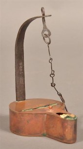 COPPER AND WROUGHT IRON BETTY LAMP.Copper