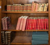TWO SHELVES OF LEATHER BOUND BOOKS,