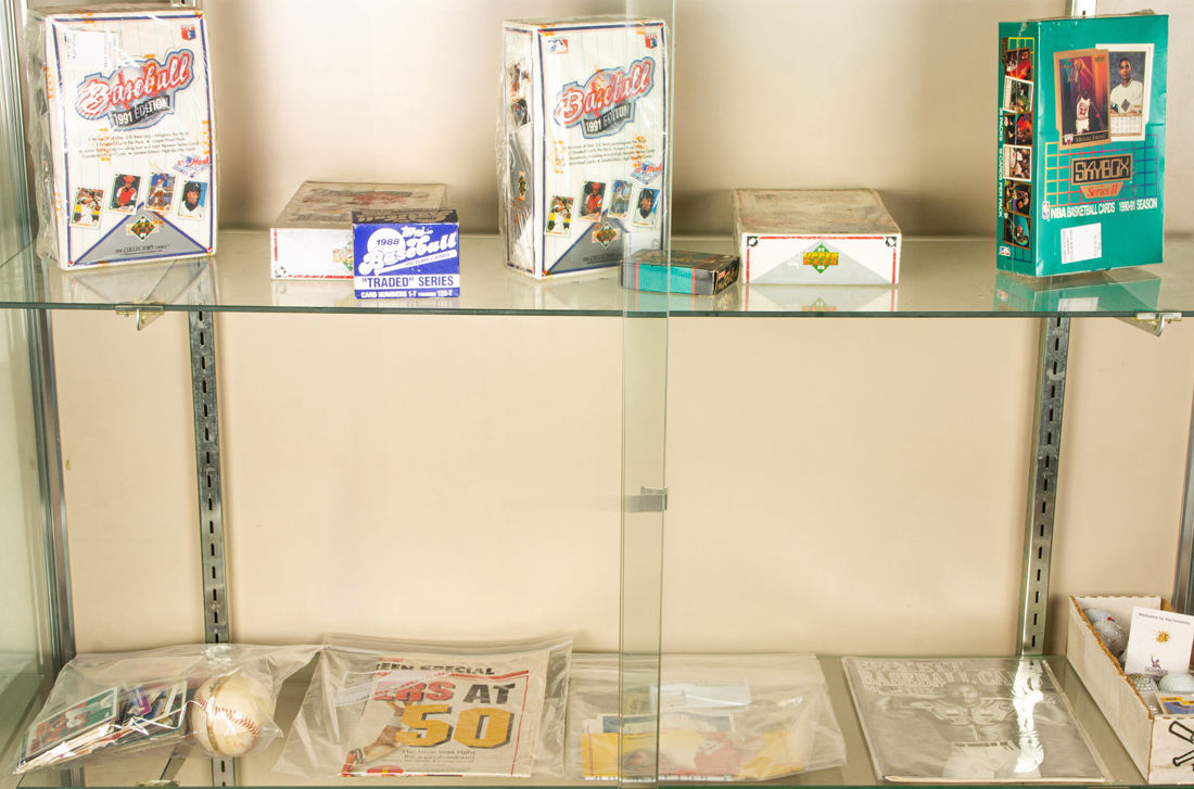 TWO SHELVES OF BASEBALL CARDS AND 3a214a
