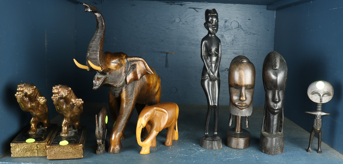 SHELF OF MOSTLY AFRICAN CARVED 3a2178