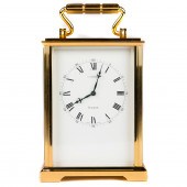 A GILT BRASS 8-DAY CARRIAGE CLOCK, RETAILED