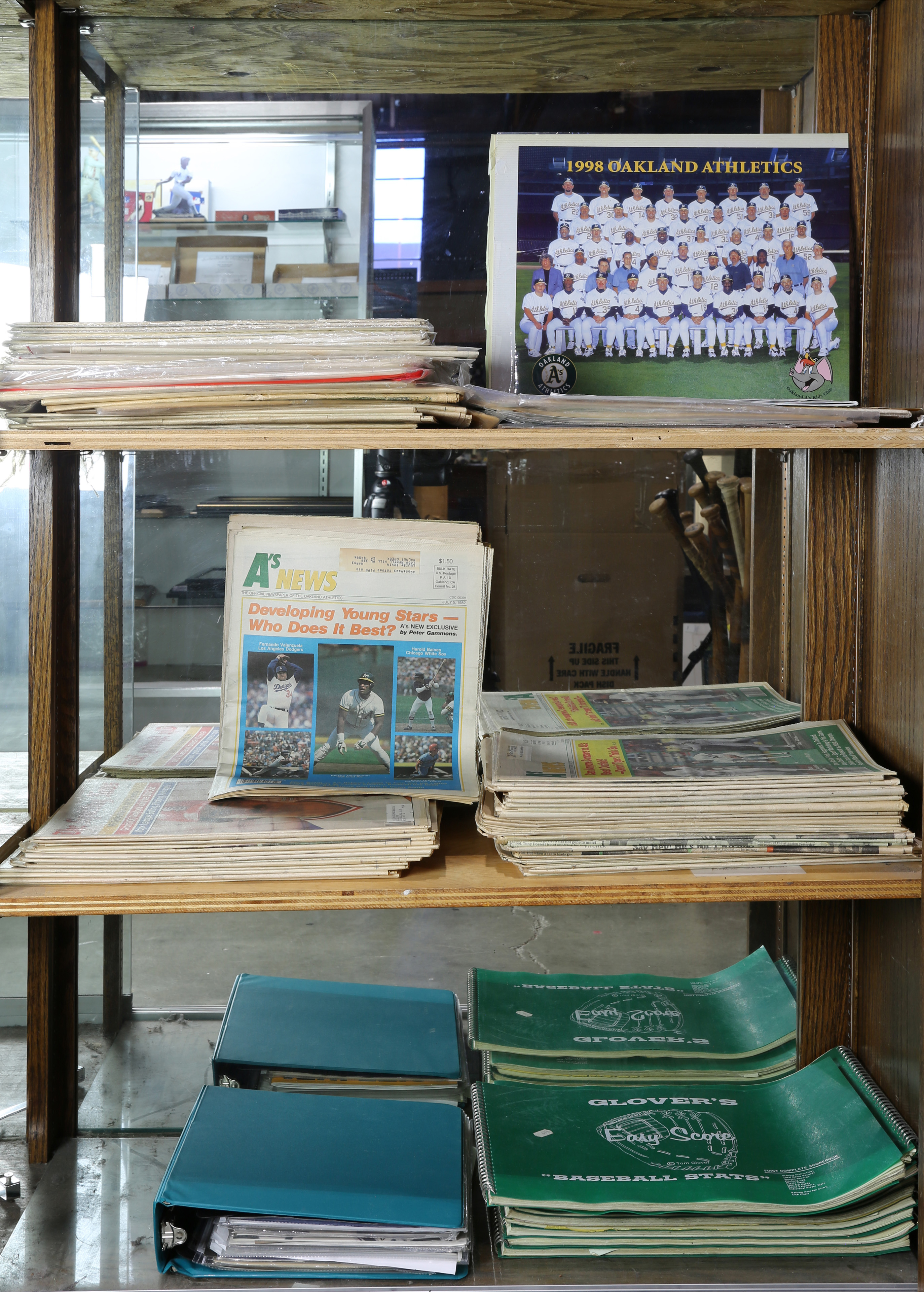THREE SHELVES OF NEWSPAPERS INCLUDING 3a62af