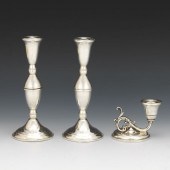 THREE STERLING CANDLE HOLDERS  A pair