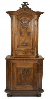 19TH C. FRENCH TWO-PART CARVED OAK CABINET.