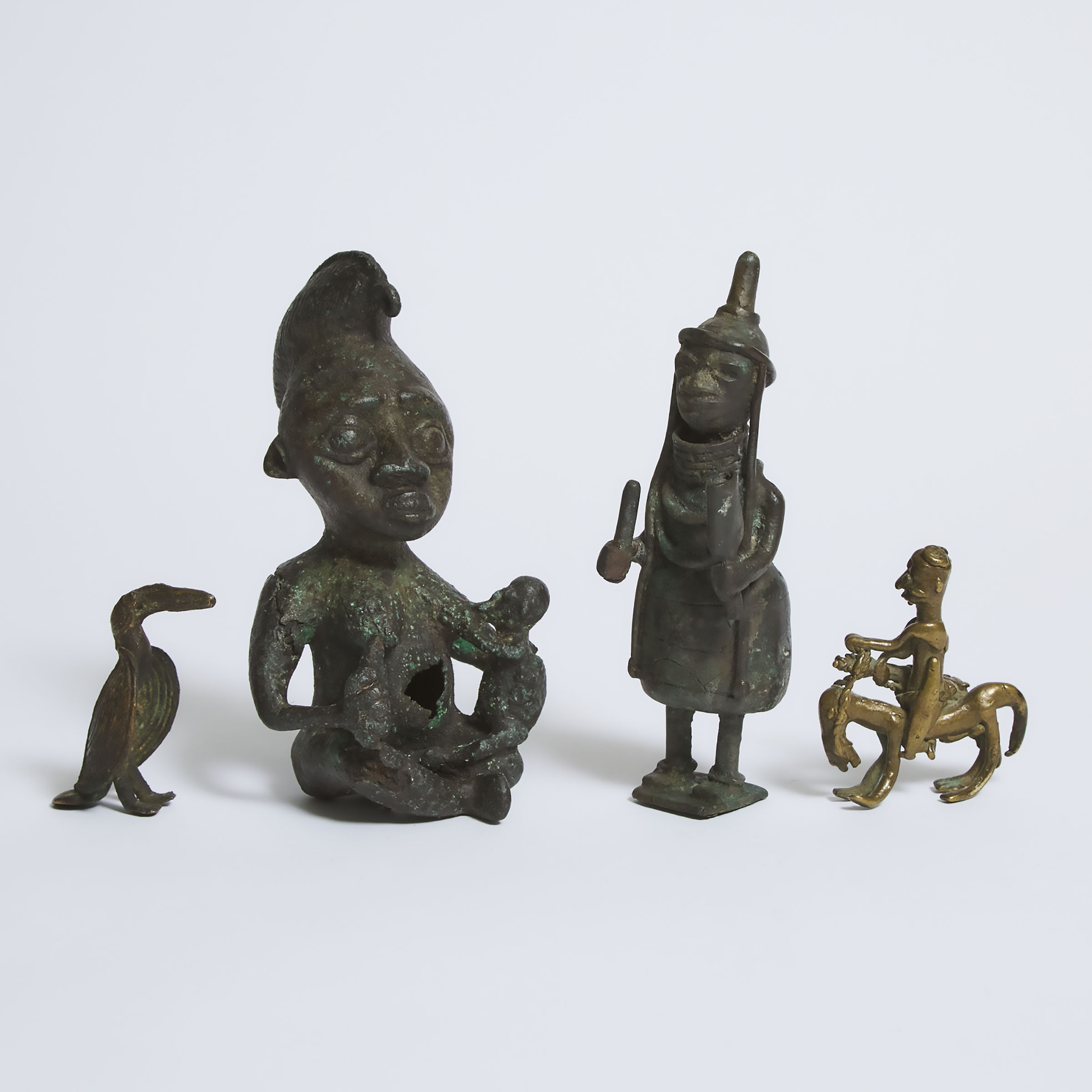 Group of Four African Bronze Sculptures  3aadbb