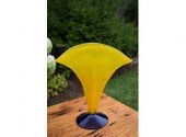 An art glass yellow pillow form vase