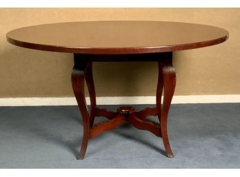 A modern cherry dining table with