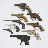 Collection of Eight Cork and Cap Guns,