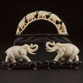 A Pair of Ivory Figures of Elephants,