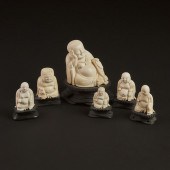 A Group of Six Ivory Figures of Buddhas,