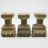 A Set of Three Carved and Polychromed