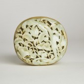 A White Jade Reticulated Dragon Plaque,