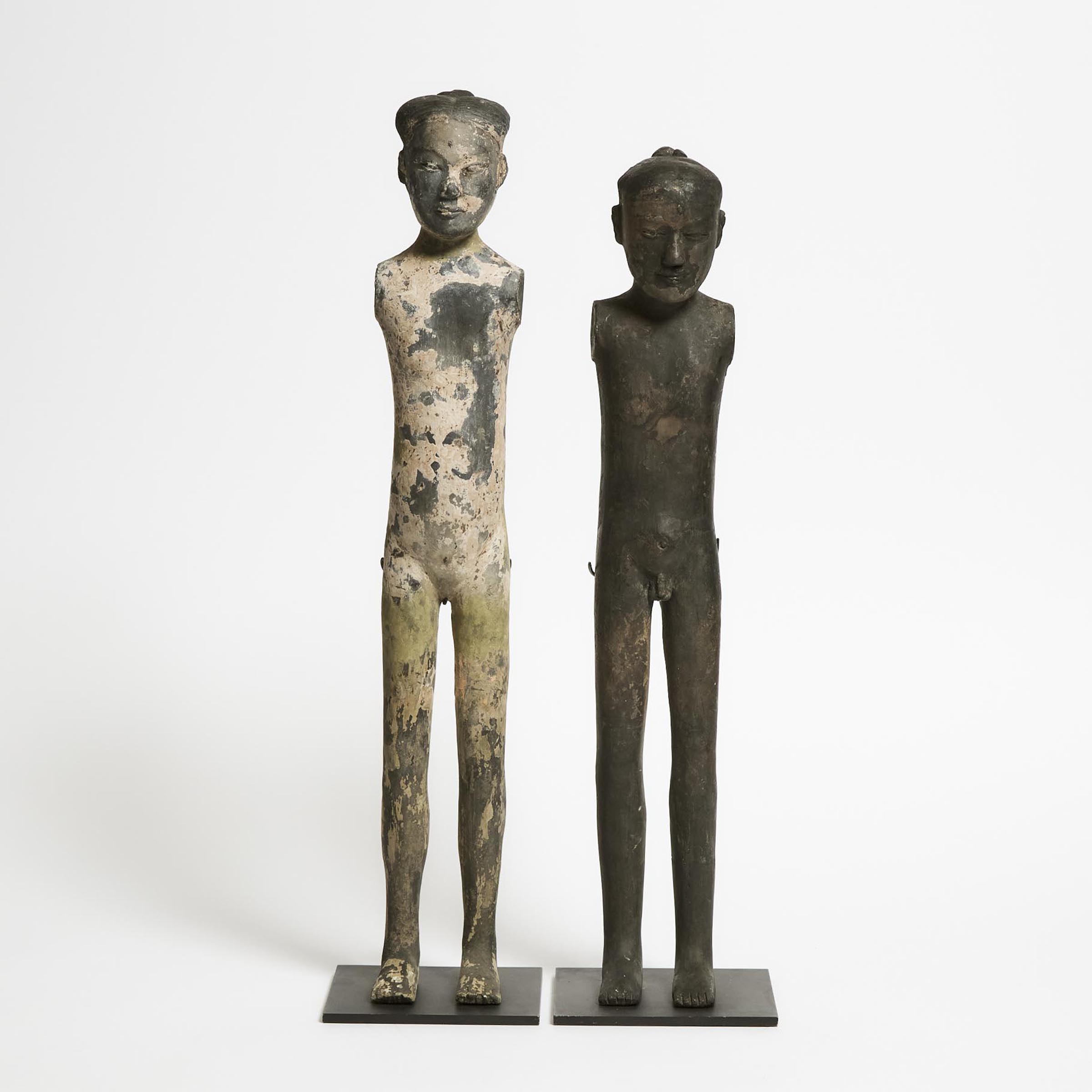 Two Pottery Figures of a Female 3aa732
