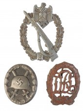 A COLLECTION OF GERMAN MEDALS AND BADGES