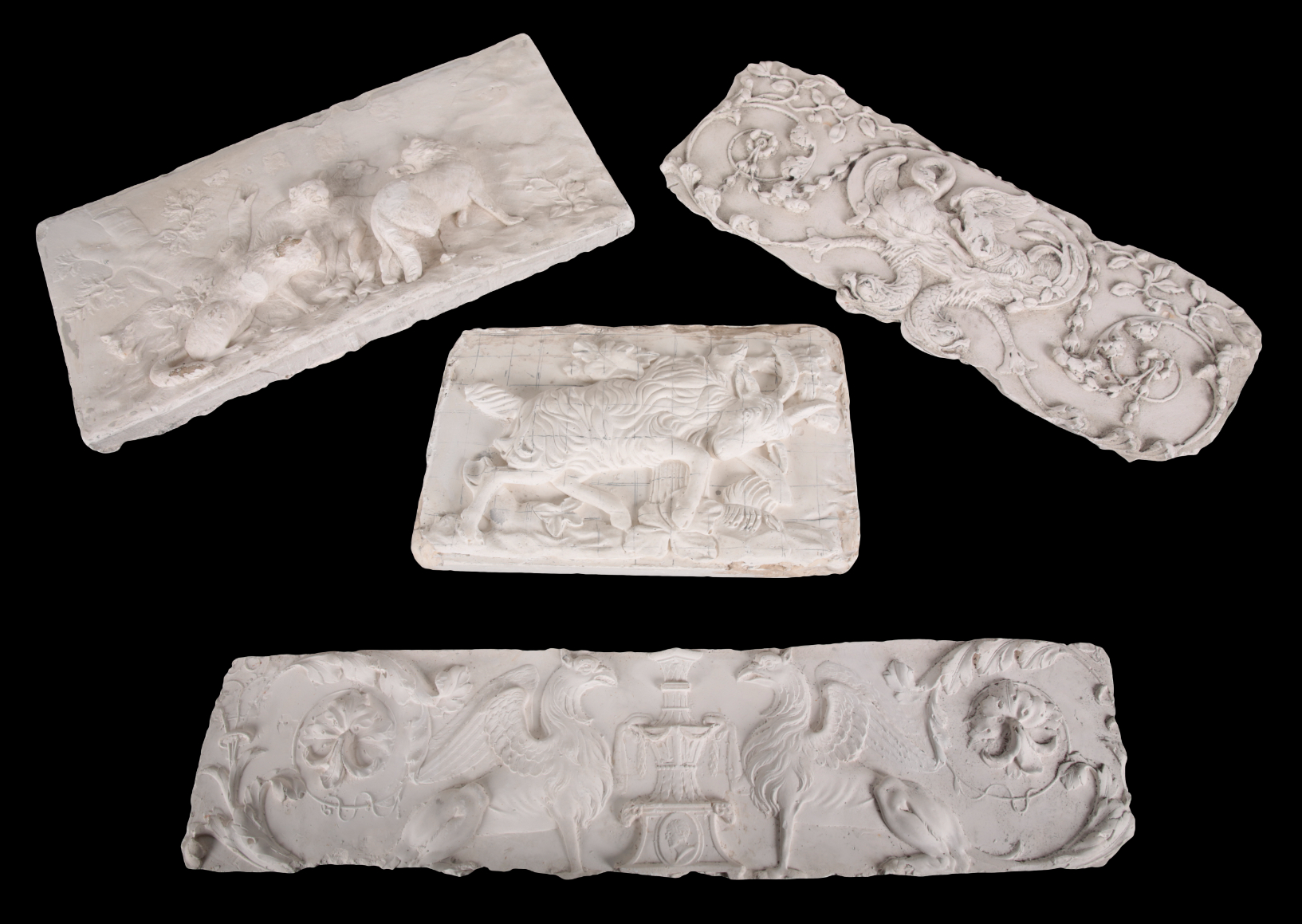 A GROUP OF FOUR PLASTER FRIEZE