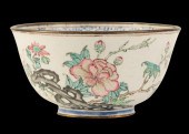 A CHINESE CANTON ENAMEL FAMILLE ROSE