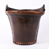 A COPPER STUDDED LEATHER FIRE BUCKET