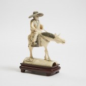 An Ivory Carving of a Horse Rider, Early