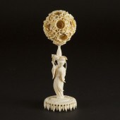 A Chinese Ivory Puzzle Ball and Stand,