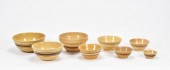 ANTIQUE YELLOW WARE BOWLS. Group of