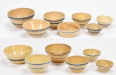 GROUP OF ANTIQUE YELLOW WARE BOWLS.