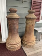 A very unique pair of cast iron lamp