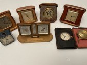 Eight Antique and vintage travel clocks,