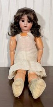 Ca. 1900-1919 bisque head doll made