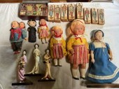 A collection of vintage dolls, including: