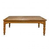 A waxed pine kitchen table, 19th / 20th