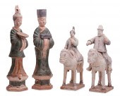 FOUR CHINESE POTTERY BURIAL FIGURESFour