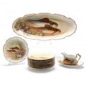 SET OF LIMOGES FISH TABLEWARE, 12 PIECES