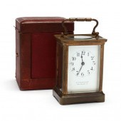 A FRENCH BRASS CARRIAGE CLOCK WITH ORIGINAL