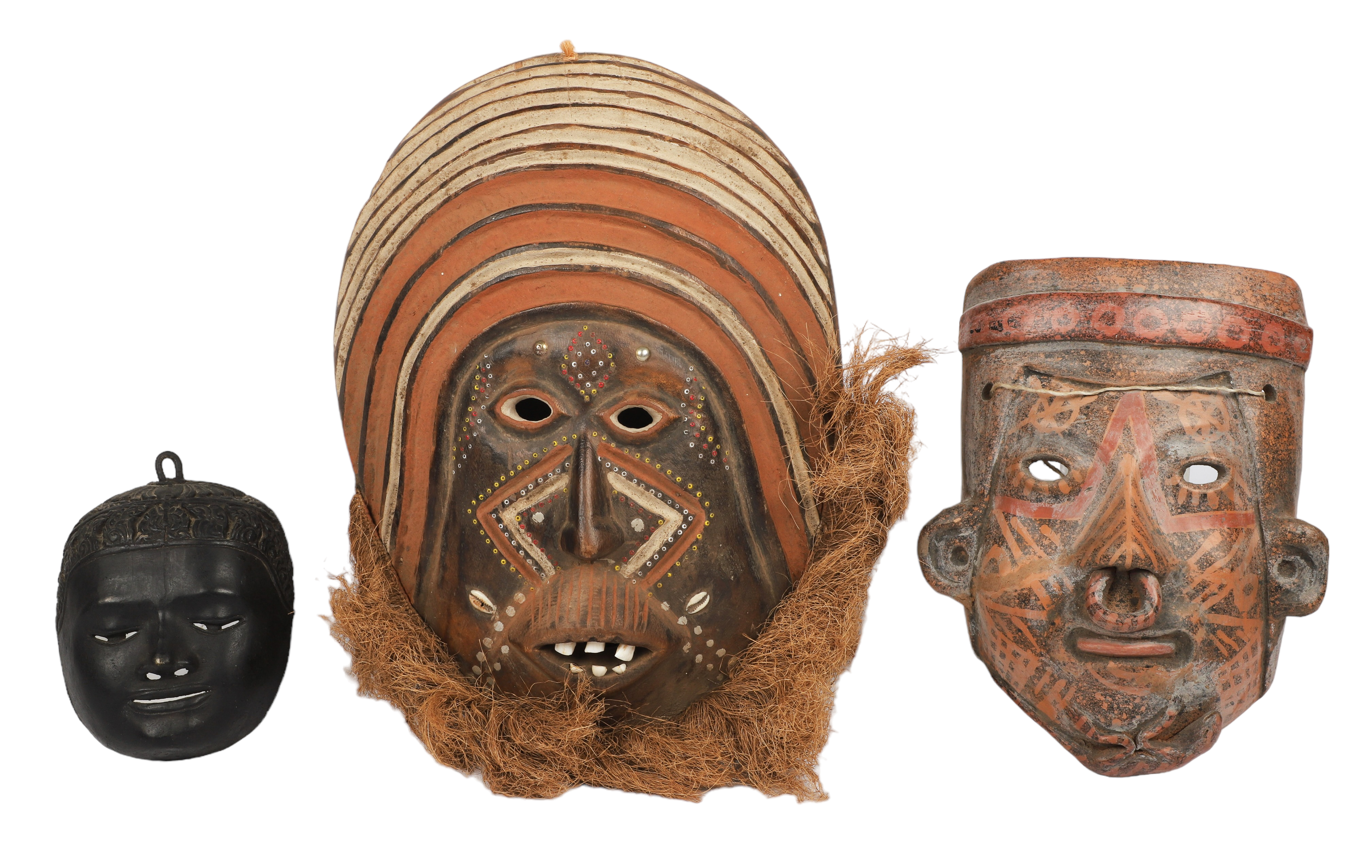  3 Ethnic masks c o African carved 3b1046