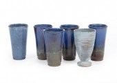 FOUR SHEARWATER ART POTTERY TUMBLERS,