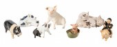 (7) Porcelain pig figurines, c/o Lladro
