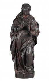 Carved oak wall hanging depicting St
