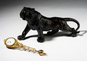 PATINATED METAL TIGER FIGURE WITH SWING
