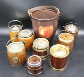 A COLLECTION OF WOODEN BISCUIT JARS