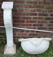 AN ANTIQUE CARVED MARBLE BASIN WITH